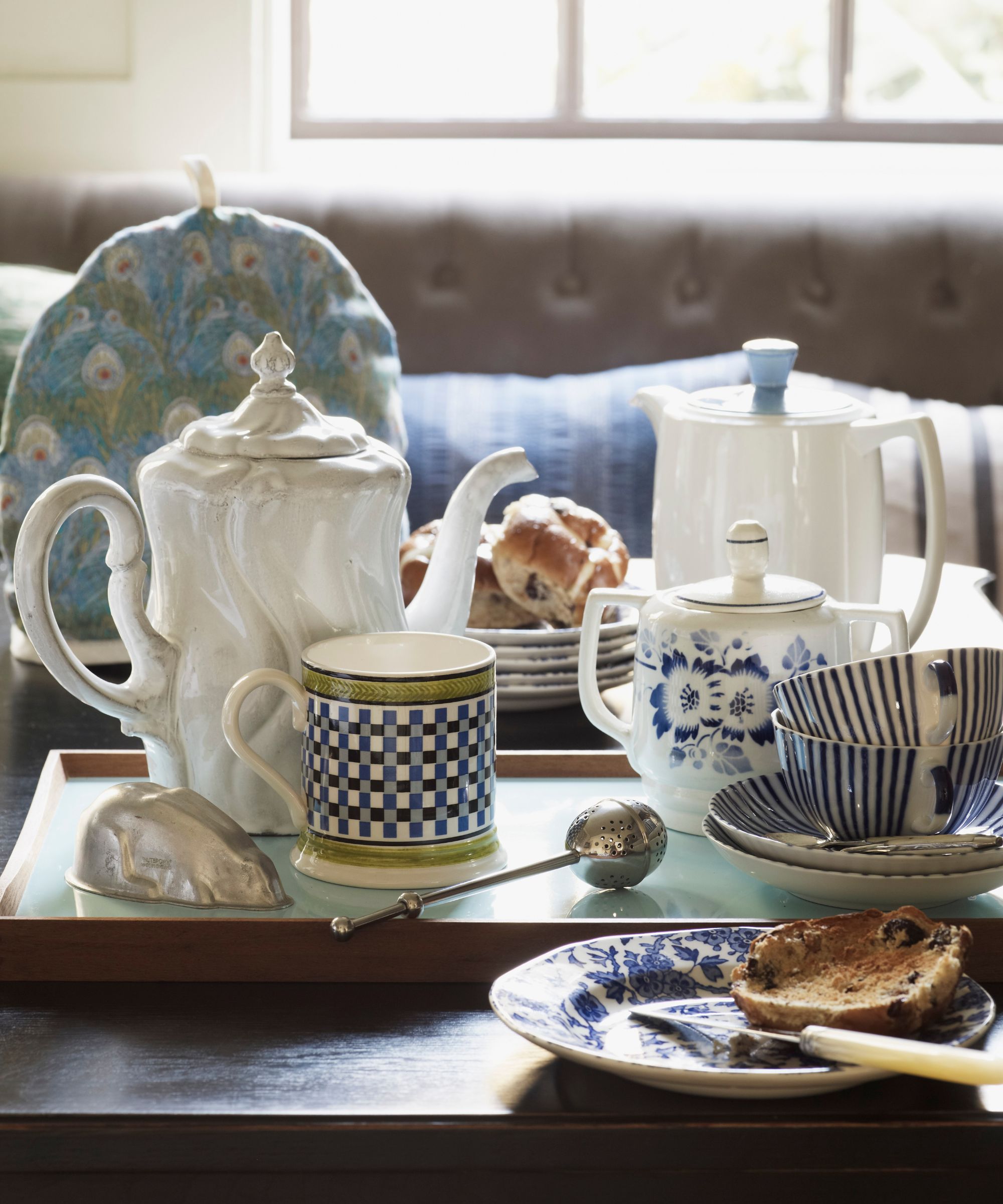 Blue and white tea set with hot cross buns