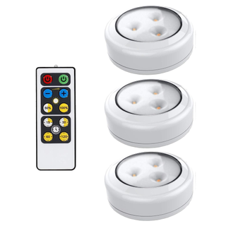 Three puck lights with a remote