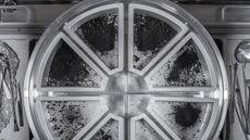 A close-up of NASA's OSIRIS-REx sample trays, containing dust and rubble plundered from asteroid Bennu.