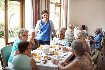 Residents dine at a senior living community.