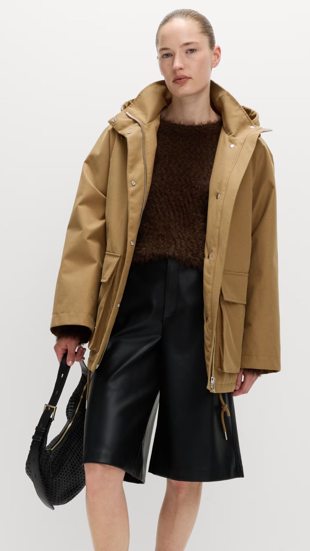 a model wearing the M&amp;amp;S waterproof coat