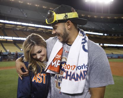 Houston Astros' Carlos Correa and fiancé Daniella Rodriguez.