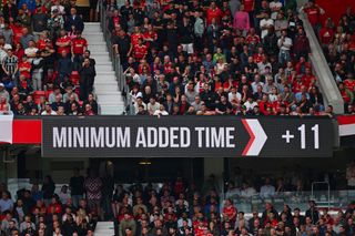 A view of an LED board displaying 11 minutes of added time during the Premier League match between Manchester United and Nottingham Forest at Old Trafford on August 26, 2023 in Manchester, England. (Photo by Stu Forster/Getty Images)