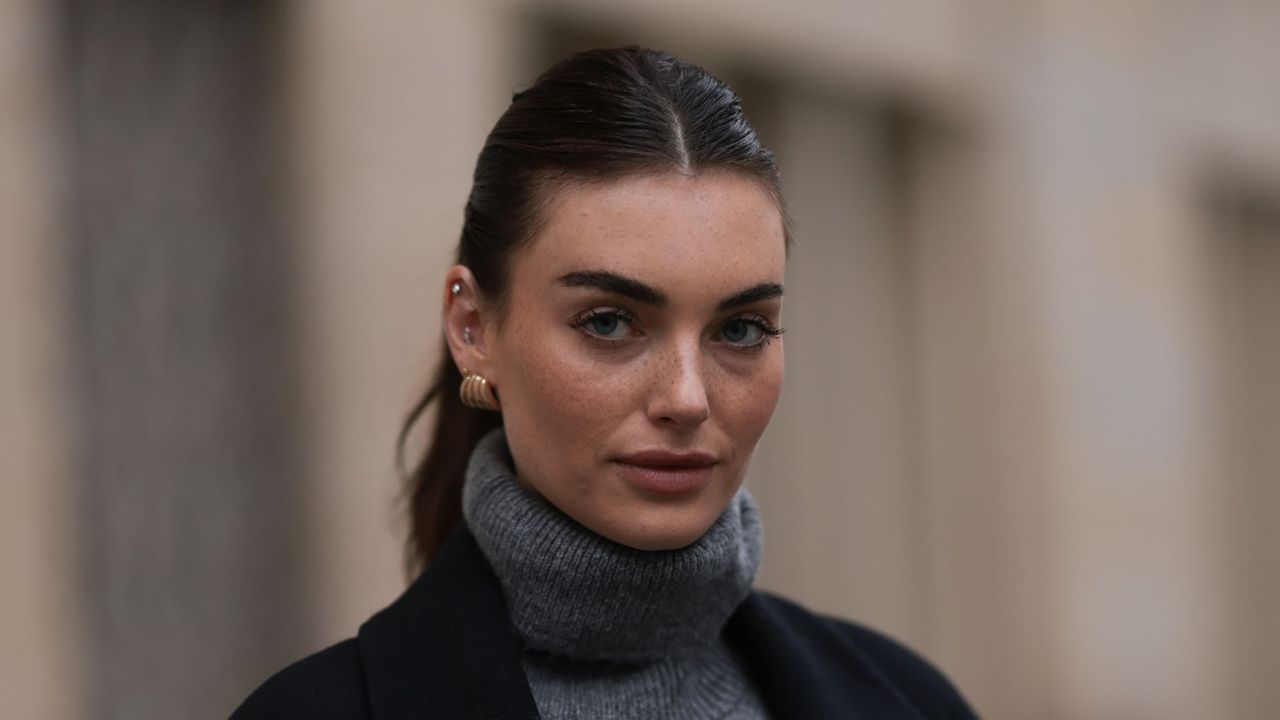 best mascara for volume - woman with a ponytail looks at the camera gettyimages 1784228060