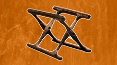 an x-shaped folding wood chair frame against an orange background