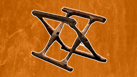 an x-shaped folding wood chair frame against an orange background