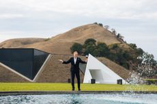Jean-Charles Boisset standing outside of newly acquired Artesa winery next to the pool
