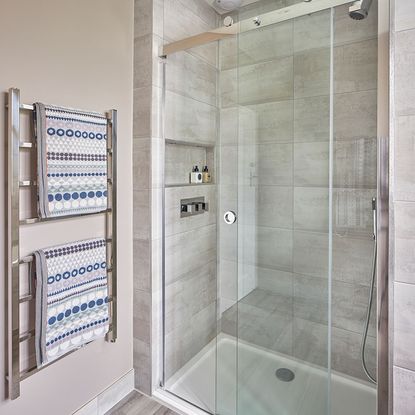 Modern grey bathroom makeover with separate shower and bath | Ideal Home