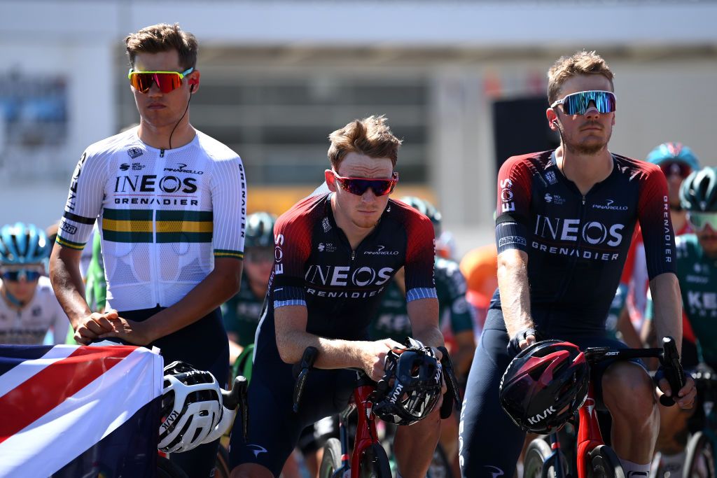 TALAVERA DE LA REINA SPAIN SEPTEMBER 09 LR Luke Plapp of Australia Tao Geoghegan Hart of United Kingdom and Dylan Van Baarle of Netherlands and Team INEOS Grenadiers observed a minute of silence in memory of Queen Elizabeth II prior to the 77th Tour of Spain 2022 Stage 19 a 1383km stage from Talavera de la Reina to Talavera de la Reina LaVuelta22 WorldTour on September 09 2022 in Talavera de la Reina Spain Photo by Justin SetterfieldGetty Images
