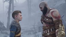 God of War screenshot of Atreus and Kratos standing face to face in a snowy wilderness