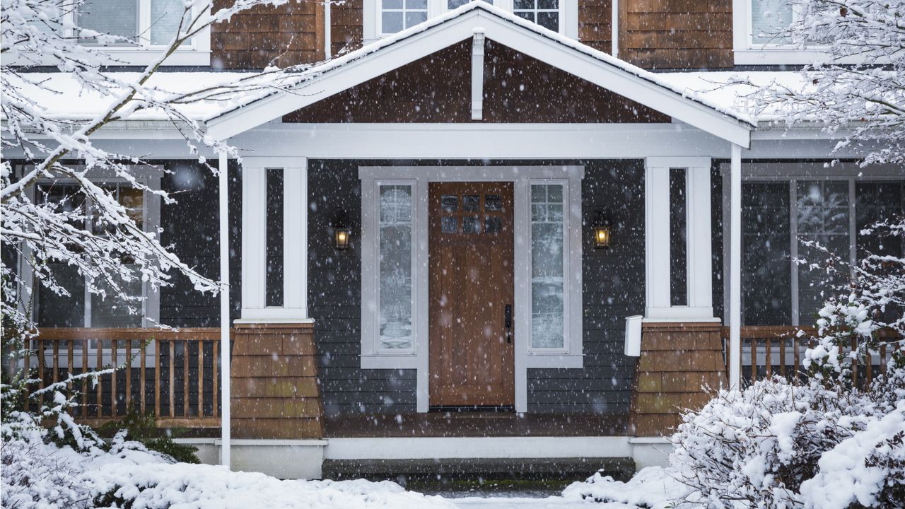 What does blowing cinnamon on your front door do