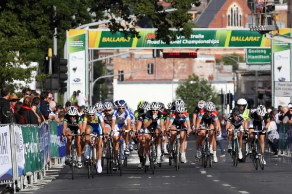 The bunch passes through the start / finish area on Sturt Street, Ballarat.