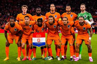 Netherlands Euro 2024 squad Mats Wieffer of the Netherlands, Lutsharel Geertruida of the Netherlands, Virgil van Dijk of the Netherlands, Cody Gakpo of the Netherlands, Netherlands goalkeeper Mark Flekken, Georginio Wijnaldum of the Netherlands, Tijjani Reijnders of the Netherlands, Jeremie Frimpong of the Netherlands, Nathan Ake of the Netherlands, Xavi Simons of the Netherlands and Memphis Depay of the Netherlands pose for a team photo prior to the friendly match between Netherlands and Scotland at Johan Cruyff Arena on March 22, 2024 in Amsterdam, Netherlands.(Photo by Rene Nijhuis/MB Media/Getty Images)