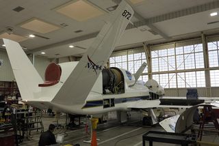 NASA Global Hawk being loaded with monitoring equipment for the ATTREX mission.