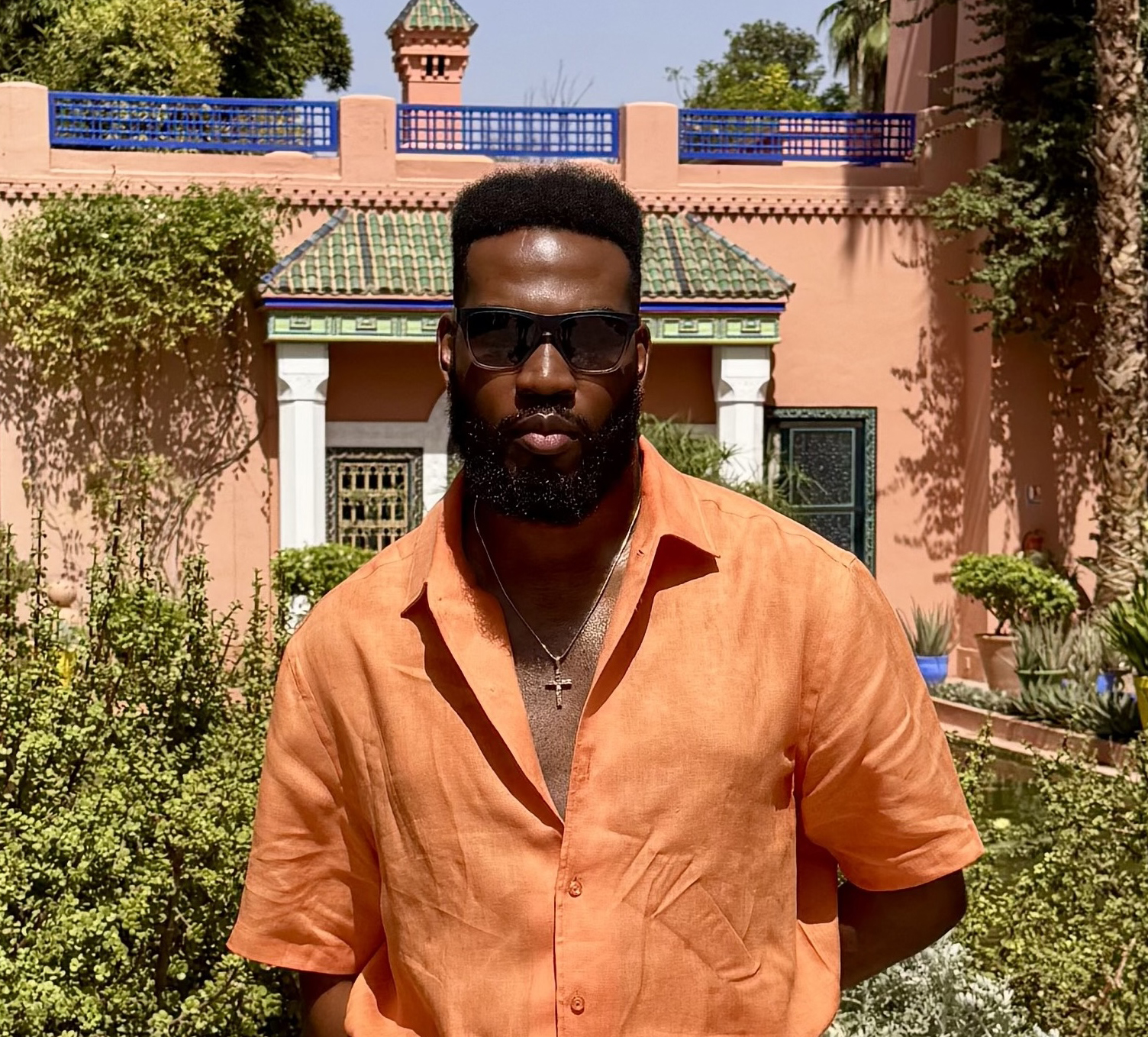 man with orange shirt