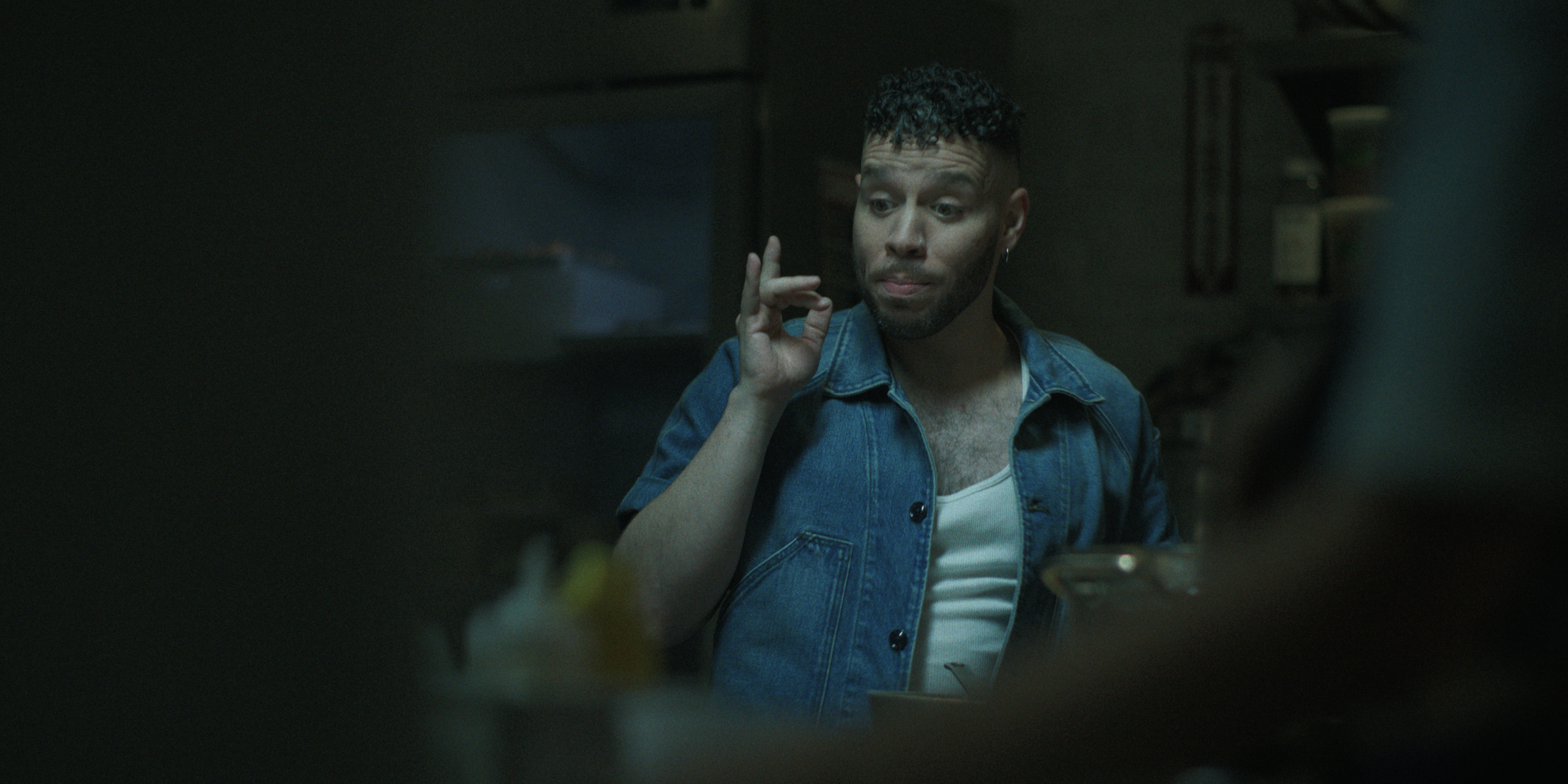 Robin de Jes&amp;uacute;s as chef Tony in the kitchen in black rabbit