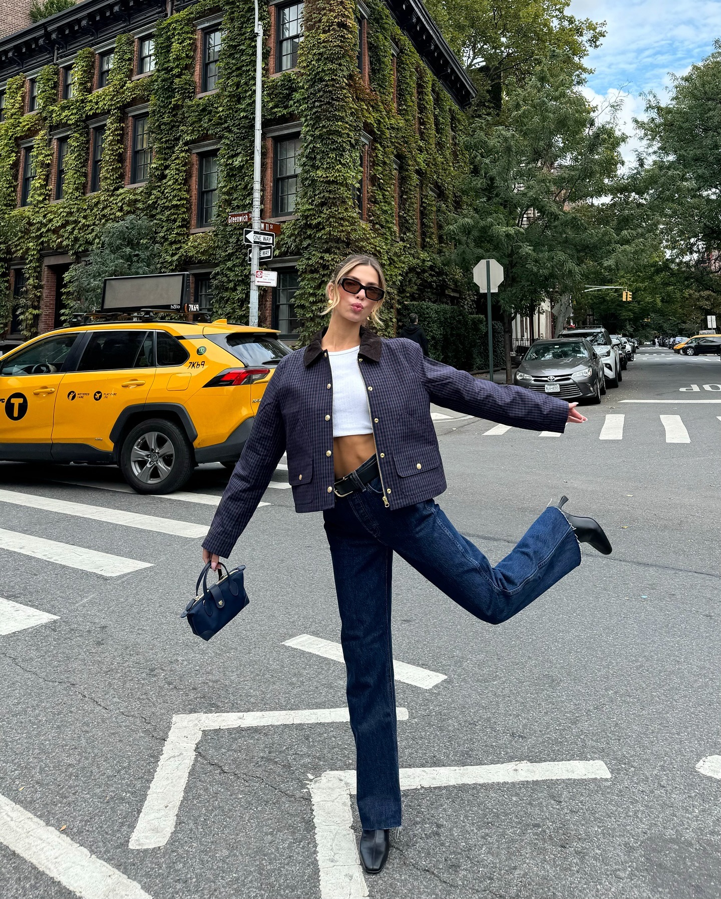 Fashion person Kit Keenan wears winter jeans outfits 2025.