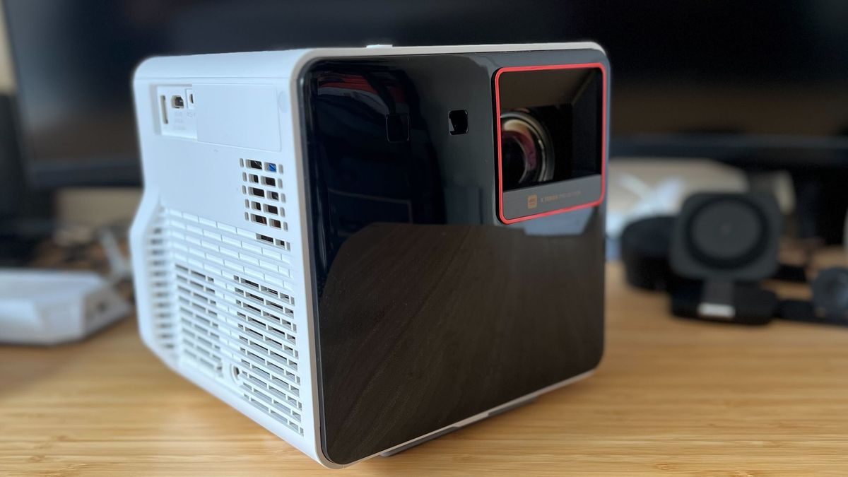 BenQ X300G projector on a wooden desk