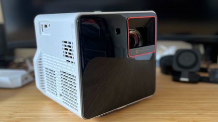 BenQ X300G projector on a wooden desk