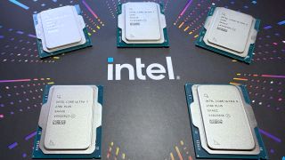 A group photo of Intel's primary Arrow Lake and Arrow Lake Refresh desktop processors (Core Ultra 9 285K, Core Ultra 7 265K, Core Ultra 5 245K, Core Ultra 7 270K Plus, Core Ultra 5 250K Plus) resting on top of an Intel-branded box