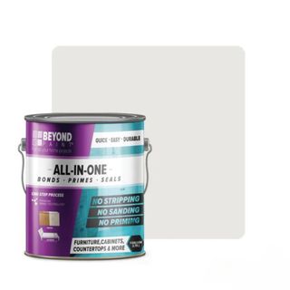 A pot of Beyond Paint white paint, the logo is purple and teal