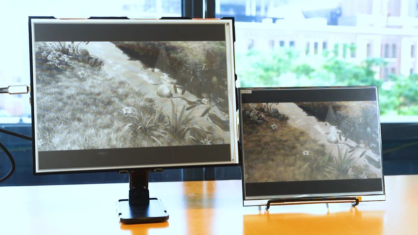 Two e-paper displays sitting side by side on a table