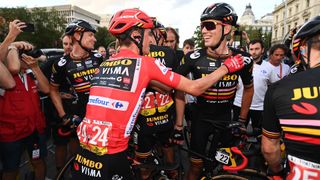 Sepp Kuss celebrating with his Jumbo-Visma team after winning the vuelta a españa 2023