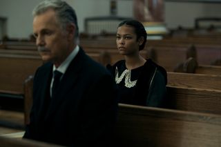 The Fall of the Usher star Bruce Greenwood sitting in a church with his granddaughter behind him