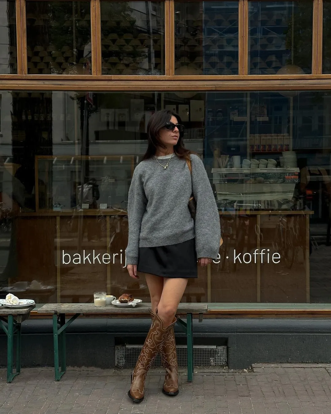 influencer Francesca Saffari wearing grey Arket jumper