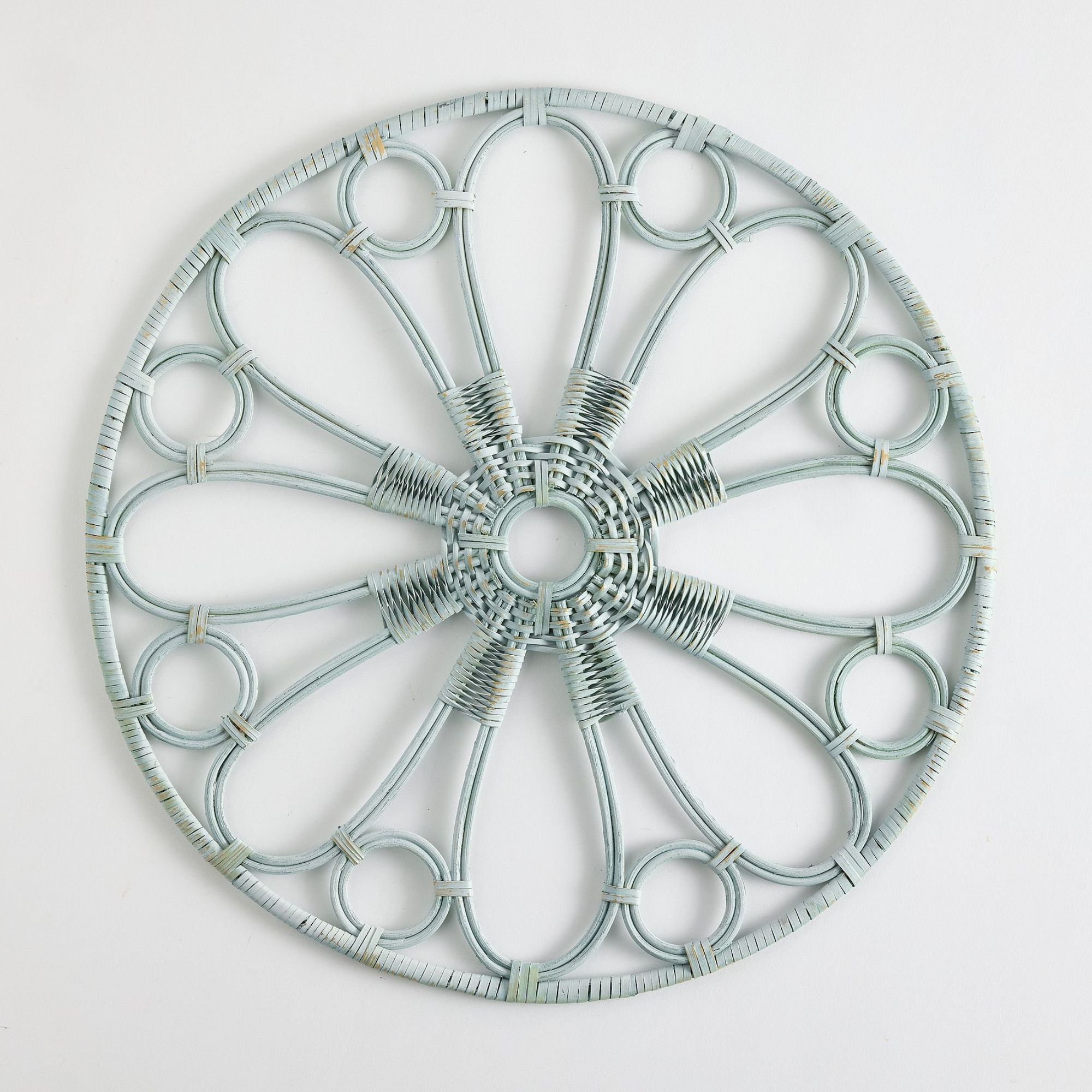 Pale blue rattan charger plate