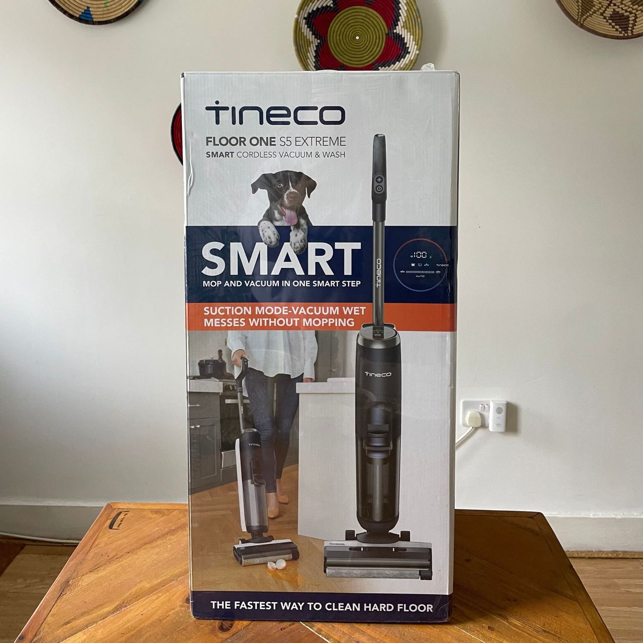 Box of the Tineco FLOOR ONE S5 Smart Mop sitting on a wooden table