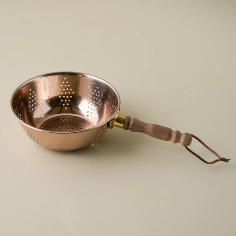 Copper colander with wooden handle