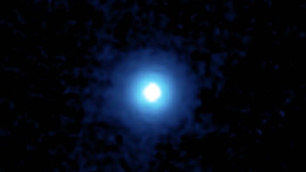 Vega star appears as a bright white orb surrounded by a blue glow.