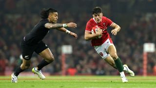 Rieko Ioane attempts to tackle Louis Rees-Zammit in the most recent Wales vs New Zealand game in 2022