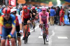 Geraint Thomas of The United Kingdom and Team INEOS Grenadiers and Tadej Pogacar of Slovenia and UAE Team Emirates - Pink Leader Jersey cross the finish line during the 107th Giro d'Italia
