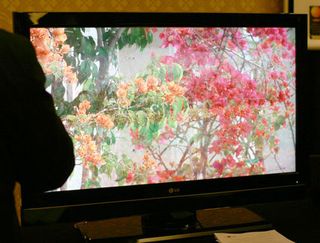 This 42-inch LCD television from LG has 5000 to 1 contrast ratio and looked good compared to other televisions we've seen. Audio comes out the bottom from almost invisible micro perforations.