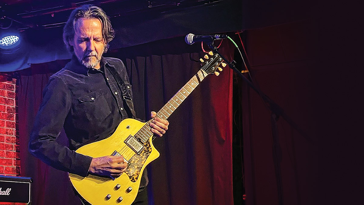 Marc Ford with his custom-made guitar from Asher
