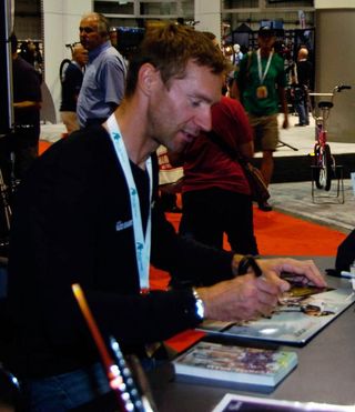 Jens Voigt signing autographs at the 2010 Interbike show