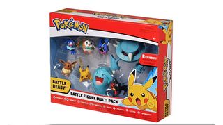 A selection of Pokemon action figures inside of plastic packaging.