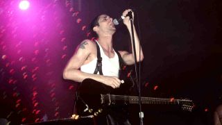 Perry Farrell of Jane’s Addiction performing onstage in 1991