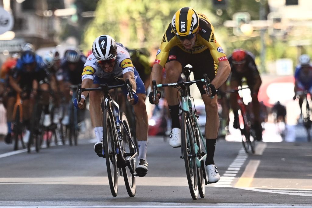 Wout van Aert (Jumbo Visma) beats Julian Alaphilippe (Deceuninck-QuickStep) to the line to win Milan-San Remo