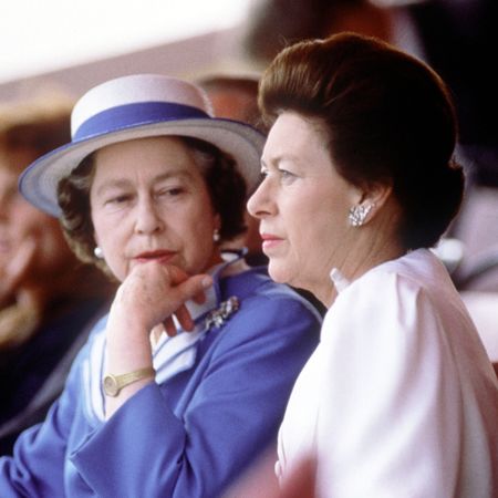 Queen Elizabeth sitting next to Princess Margaret