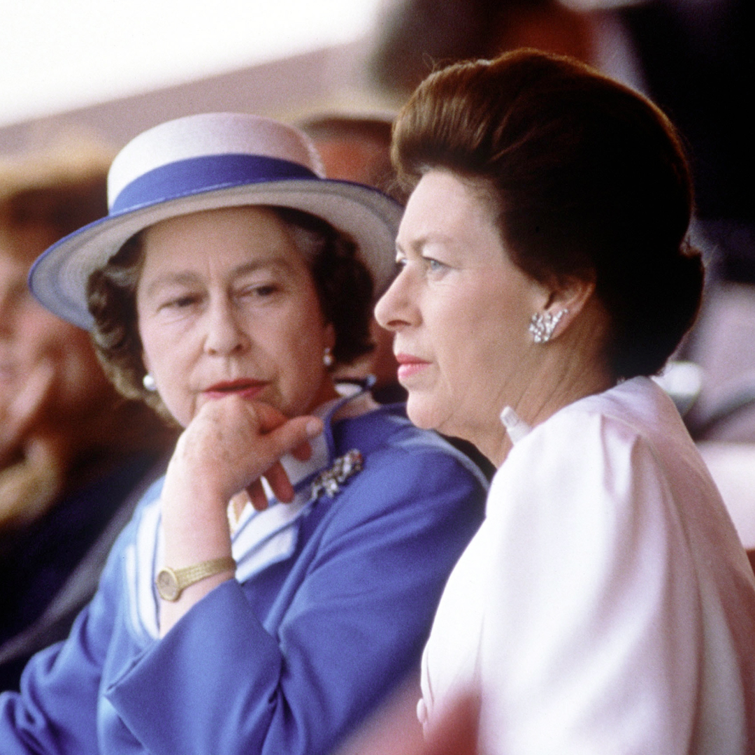 Queen Elizabeth sitting next to Princess Margaret