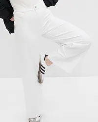 High Rise Stride Ankle Jeans with Washwell, $71 (£55) | Gap