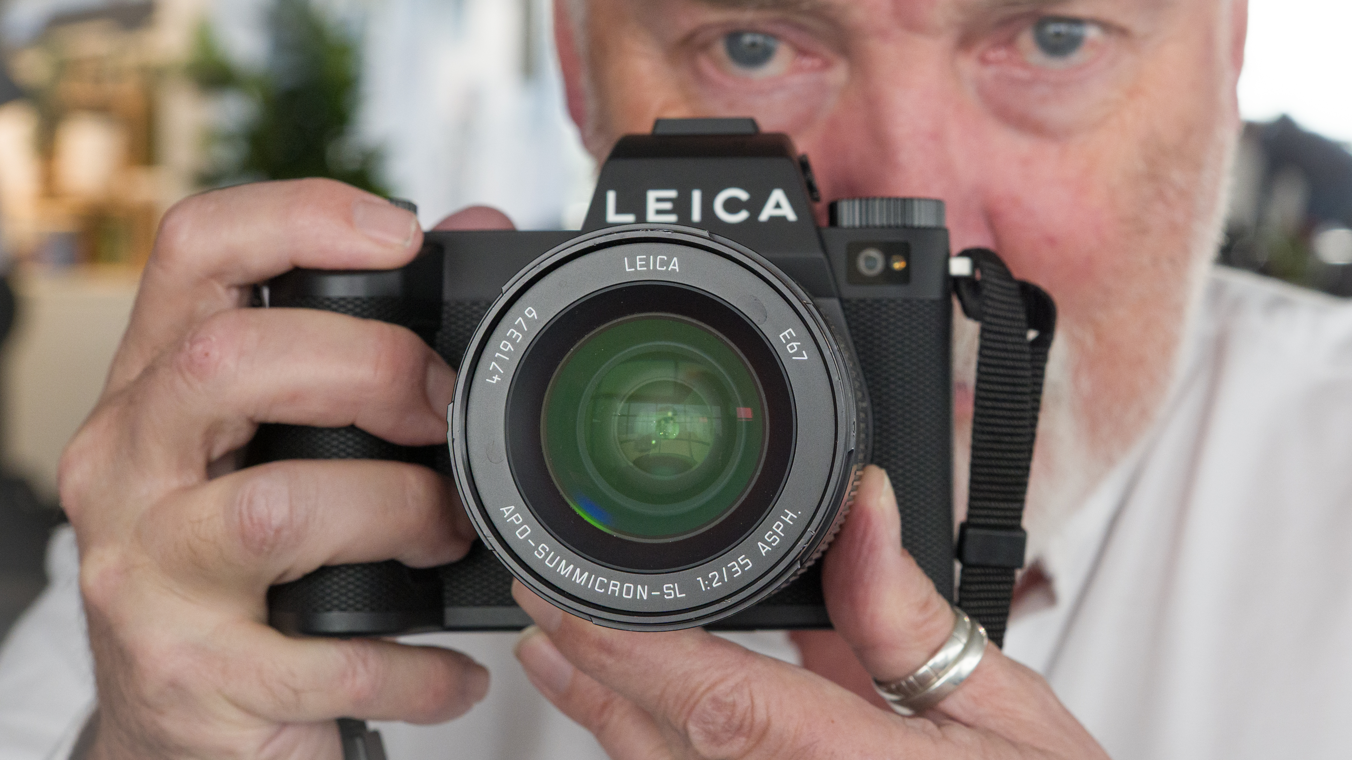 Chris George holding Leica SL3-P camera