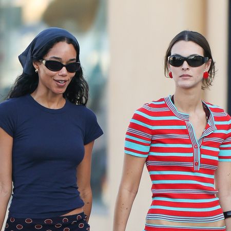 Laura Herrier and Vittoria Ceretti wearing casual pencil skirt outfits in Saint-Tropez