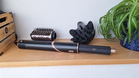 Shark FlexStyle in reviewer's home, with auto-wrap barrel attached and oval brush and diffuser sat behind it