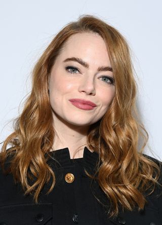 Emma Stone attends the Louis Vuitton Womenswear Fall/Winter 2022/2023 show as part of Paris Fashion Week on March 07, 2022 in Paris, France