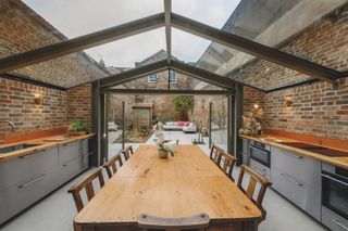 glass pitched roof extension with large kitchen diner
