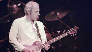 Mark Knopfler in a solo concert, playing a Les Paul Electric Guitar. Picture taken 7th May 1996. Mark Knopfler performing at City Hall in Newcastle, Tyne and Wear